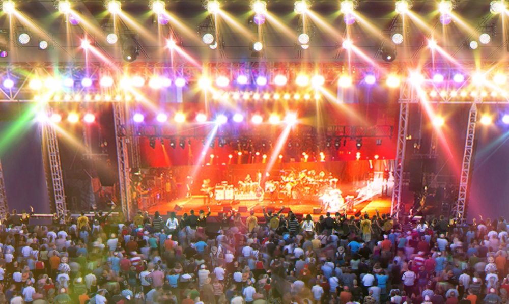 Image of a concert at the Arena at TD Place with colourful lights